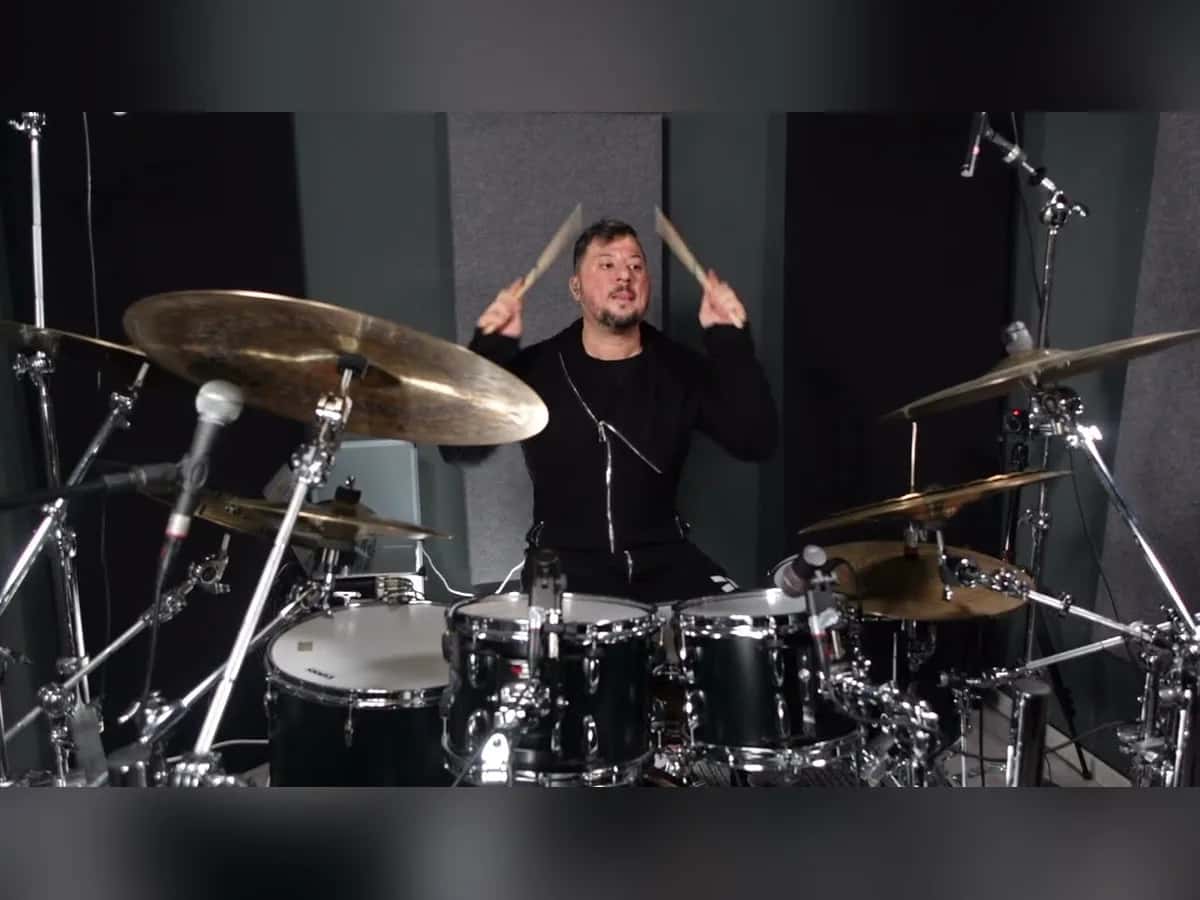 Riccardo Merlini playing drums in the studio