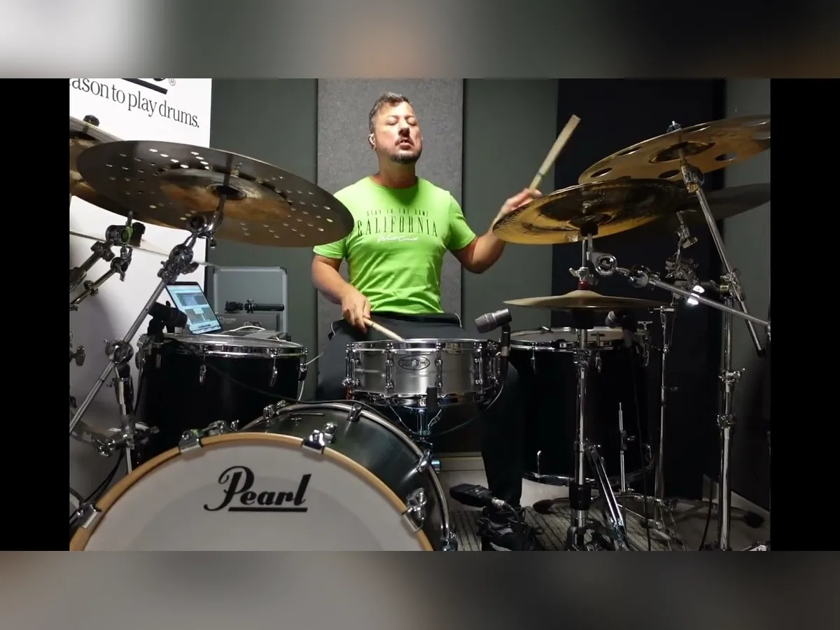 Riccardo Merlini drumming on a Pearl kit