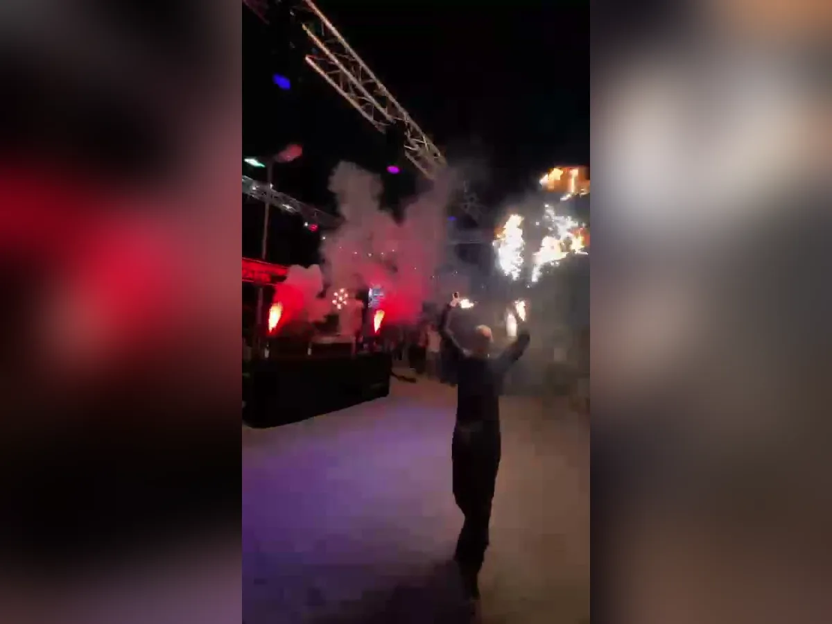 Flames over the crowd at a Rooftop Tapes event